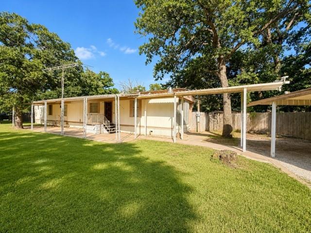 No HOA & Outside City Limits! Don't miss this opportunity to own a home on a large corner lot in highly sought-after Burleson ISD. Featuring a durable metal roof and owner financing available, this property offers flexibility and freedom that's hard to find. Bring all your toys! With two separate driveways, there's plenty of room for your RV, boat, side-by-side, trailers, work vehicles, and more. Large front and back covered patios. Inside, you'll find a unique layout where both bedrooms feature their own private en-suite bathrooms, providing comfort and privacy for family members or guests. The refrigerator stays with the home, making your move even easier.