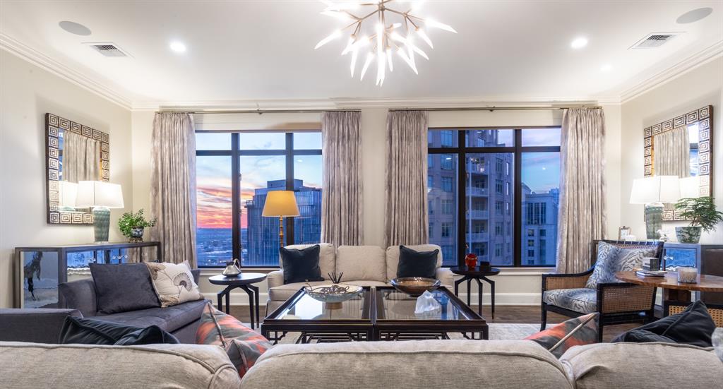 One-of-a-kind 3552 sf Ritz-Carlton custom newly renovated double unit has 2 BR, 3.1 BA, Library that could be 3rd sleeping area w Full Bath, 2 Balconies, 4 Car spaces & 2 Storage units. Dramatic double door Entry leads to a jaw-dropping Grand Foyer with opportunities for art and furnishings. Impressive open Living-Dining-Kitchen-Library-Gallery-Bar is perfect for entertaining or just easy living. Living areas are flanked by balconies to enjoy morning coffee or afternoon sunsets. Oversized gorgeous island Kitchen features Breakfast Area, Wolf & SubZero appliances & Butlers Pantry. Gracious Owner's Retreat boasts a large Sitting Area, spa-like marble Bath & 2 walk-in Closets. Split Guest suite has ensuite Bath & walk-in Closet. 5-Star Hotel amenities: Concierge, Valet, Room-service, Restaurant, Owner's Lounge, Fitness Center, heated Pool, Full-service Ritz-Carlton Spa, Reflection Park+Pet Park. Near Arts District, Klyde Warren Park, CBD, Victory Park, Design District & many Restaurants.