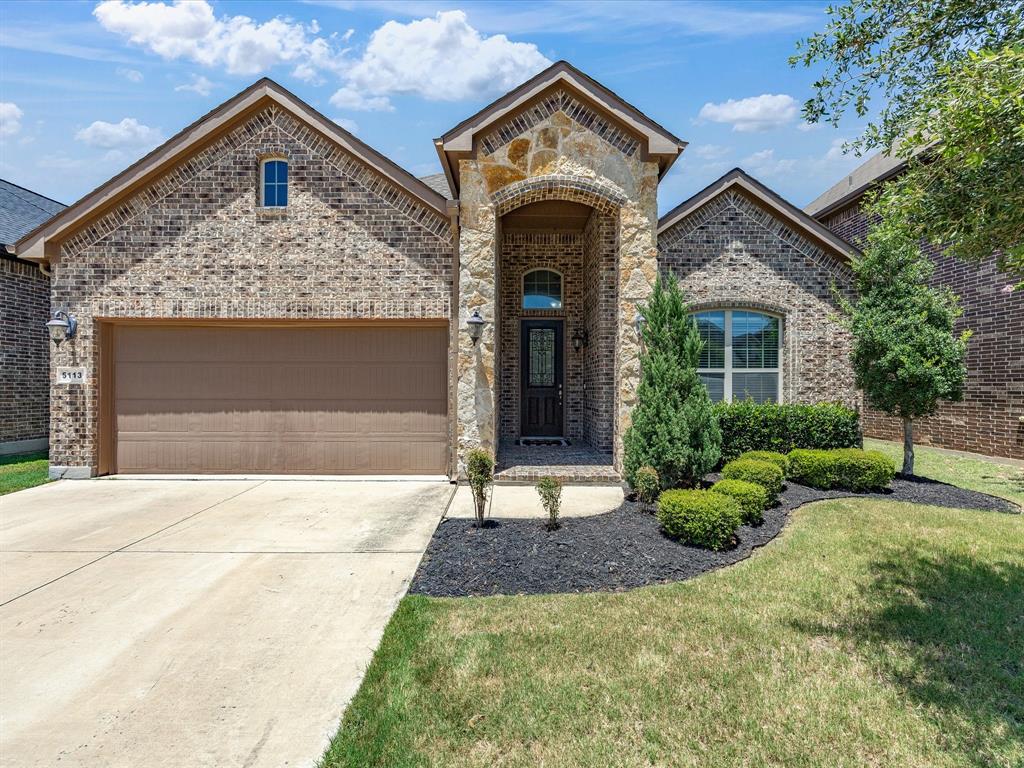 Charming 4BR 3BA home in a gated community on a quiet, inviting street in Keller ISD, with a welcoming front porch and a smart split floor plan featuring the primary suite plus two additional bedrooms downstairs. The oversized upstairs bedroom can be a flex room that can be used for a second living room, game room, mother-in-law suite, playroom, or even a home office, as it has a full bathroom and walk-in closet. The gorgeous kitchen boasts granite countertops, stainless steel appliances, and a large island overlooking the open concept living area with hardwood floors and 10 foot ceilings throughout. Low E windows offer easy cleaning, master bathroom features a beautiful framed mirror with large shower, and home features large closets throughout the home. A spacious office dining room adds flexible living space, and the large covered patio with extended concrete deck is perfect for outdoor entertaining.