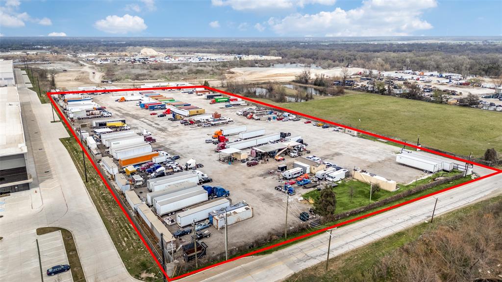 Prime commercial lot in a strategic location with excellent accessibility. The property is paved and all utilities are currently active, making it ready for immediate use. 
The site includes approximately 5 acres of red select dirt, ideal for construction or yard operations. Improvements include two manufactured office structures. The larger office measures 40 x 16 and features two bedrooms, a full bathroom, and central heat and air conditioning. The smaller office measures 20 x 16 and offers an open workspace with central heat and air conditioning.

The property is equipped with a septic system and a well installed in 2019. Additional improvements include four large carports providing ample covered space for equipment, vehicles, or materials. Carport sizes include one 75 x 50 structure and three additional 25 x 20 structures. This versatile property is well-suited for trucking operations, construction companies, equipment storage, yard use, or a variety of commercial uses while also offering the opportunity for future development.
