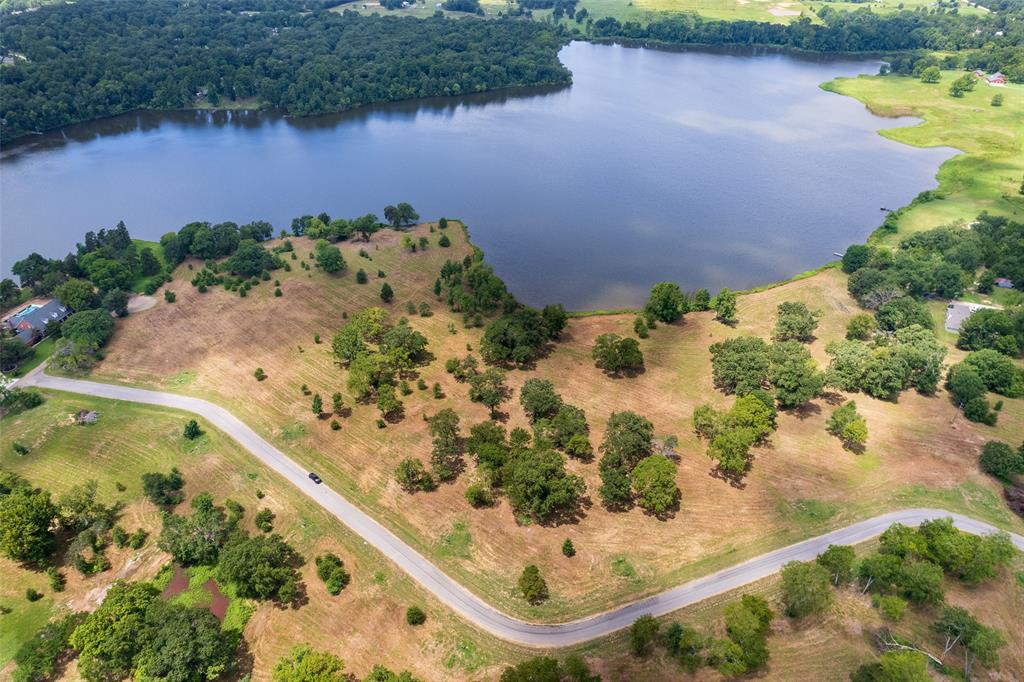 Rare opportunity for waterfront on a quiet lake with beautiful views in a spacious neighborhood! Nestled on Lake Tankersley in Northeast, Texas, this attractive, gently-sloped 1.4 acre property has access to 308 feet of shoreline. Carolina Way is a new subdivision offering oversized lots, making it the perfect place to spread out & build your dream home. While it is tucked away in a peaceful lake retreat, the conveniences of town are not far away, including shopping, dining, and healthcare. Come fish, relax and stay a while...waterfront lots are limited so give us a call today!