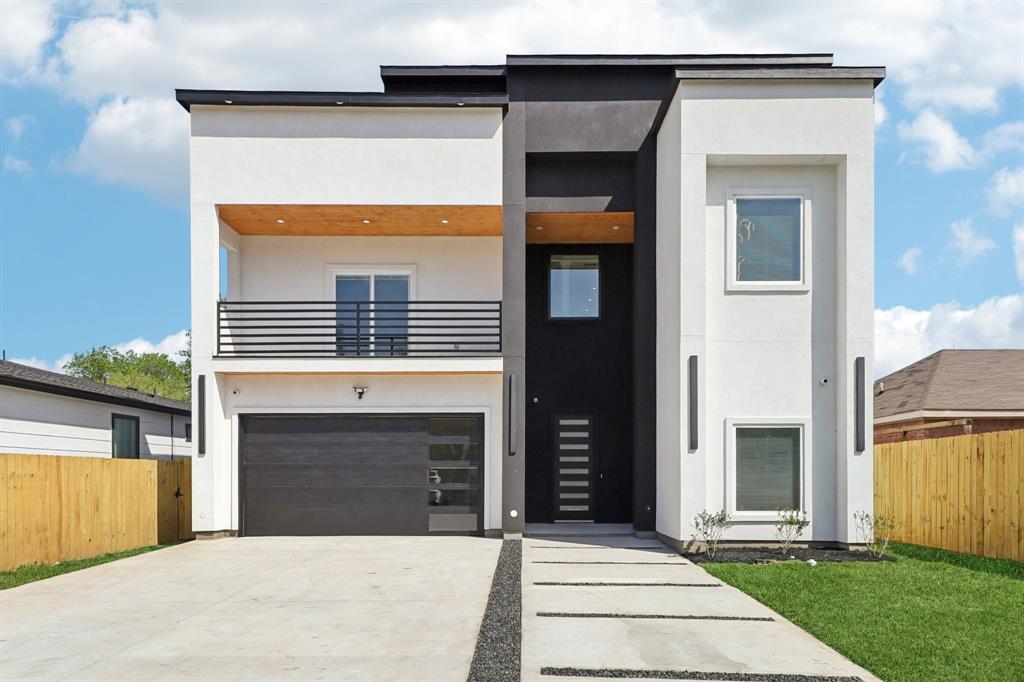 Stunning new construction within 15mins of Downtown Dallas! This gorgeous modern design features a spacious open-concept main level with sleek kitchen, living, & dining spaces that combine to create an entertainer's dream loaded with designer touches! Main level also features secluded primary suite on rear of home with large windows, and spa-inspired bath. Gorgeous kitchen featuring quartz counters, island with seating, and stainless appliances. Custom fixtures & LED lighting throughout. Head up the handcrafted oak tread staircase to find an additional living area complete with wet bar & balcony, 3 large bedrooms, and 3 additional full baths. Builder 1-2-10 warranty included! This home also qualifies for a 1.75% lender credit as part of the Community Reinvestment Act!