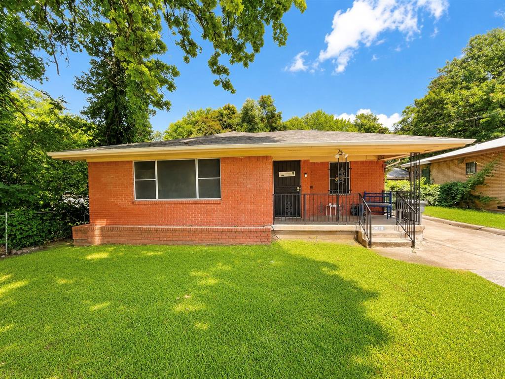 Welcome to 3023 Carpenter Avenue, a charming single-story brick home offering 3 bedrooms, 1 full bathroom, and 1,633 square feet of living space. Situated on a spacious 0.196-acre lot in the established Woodlawn Place neighborhood, this property combines classic character with incredible potential.

Inside, you'll find multiple living areas, including a large living room and den featuring built-in cabinetry, natural woodwork, and original hardwood floors.  The functional kitchen offers ample storage, while the generously sized bedrooms provide comfortable living with ceiling fans throughout.

The exterior features a covered front porch, patio, rain gutters, a gated driveway, and a detached two-car garage, providing plenty of parking and storage. The fenced backyard offers space for outdoor entertaining, gardening, or future enhancements.

Conveniently located near Downtown Dallas, major highways, schools, shopping, dining, and employment centers, this property presents an outstanding opportunity for investors, flippers, and buyers looking to build equity. With solid bones, a desirable lot size, and strong upside potential, this home is an ideal candidate for a renovation, fix-and-flip project, rental investment, or personalized remodel. Whether you're an experienced investor or a homeowner with a vision, this property offers the chance to unlock significant value.

Schedule your private showing today and discover the possibilities this Dallas investment gem has to offer!