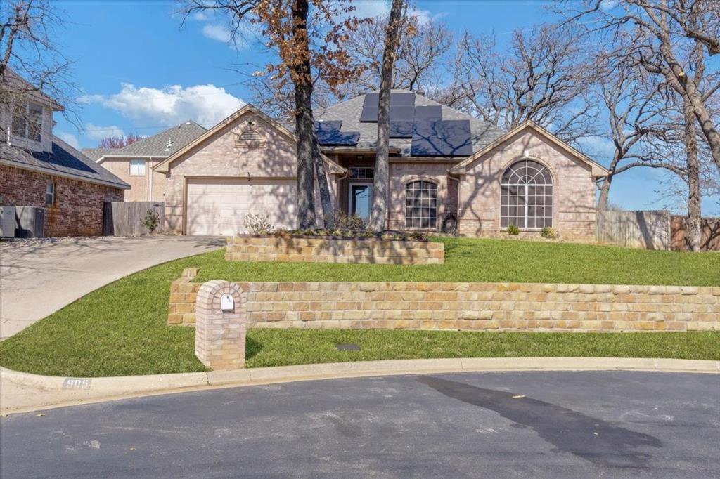 Welcome to this remarkable home ideally situated in the heart of Hurst, offering quick commuter access and the highly regarded HEB school district. Nestled in a mature neighborhood surrounded by towering trees, this property sits on a quiet cul-de-sac lot with minimal traffic—an ideal setting for comfort and privacy. Inside and out, the home has been immaculately maintained, reflecting true pride of ownership. The spacious primary bedroom features an en-suite bath complete with a soaking tub and separate shower. Two additional bedrooms are bright, inviting, and thoughtfully designed. An oversized garage—rare for a home of this age—adds valuable storage and flexibility. This home is truly move-in ready, with an extensive list of upgrades including an Air purification system, new water heater, HVAC, thermostat, furnace, French drains and refreshed landscaping, Garage door opener motor, Gas range, garbage disposal, dishwasher, Epoxy ultimate topcoat on kitchen island, Remote-controlled sprinkler system, Porcelain tile flooring in secondary bedroom, Updated sink and epoxy countertop in secondary bathroom. Don’t miss this opportunity to own a beautifully cared-for home in a prime location. Solar panels will be paid off at closing.