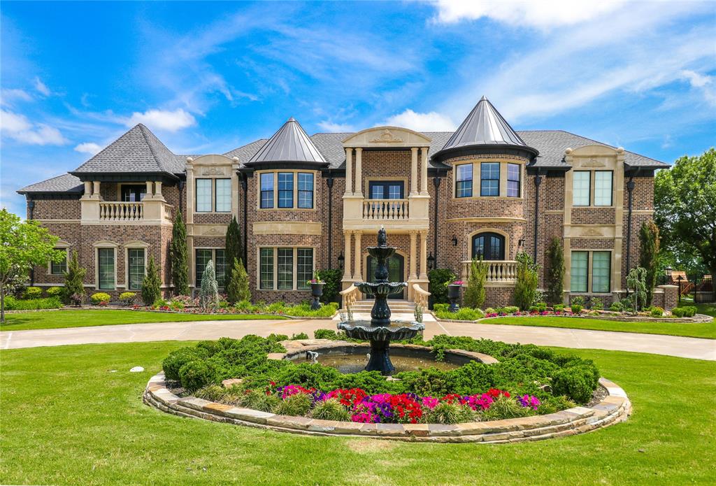 Stunningly updated, fully furnished waterfront home on Lake Ray Hubbard includes 6 bedrooms, 4 with private sitting areas, 4 full and 4 half baths. Multiple dining and living areas, custom theater room, and gameroom with full bar and balcony overlooking the lake are ideal for entertaining. Outdoors find more dining and living areas, outdoor kitchen, private bath, 2 fireplaces, and a pool surrounded by fire bowls and lake views. Lakeside you'll find a large firepit with additional seating, and a new boathouse with room for all of your water toys! 4 car garage with workshop and golf cart storage, motor court, gated drive, 2 master suites, and an elevator are just a few more of the features this home has to offer.