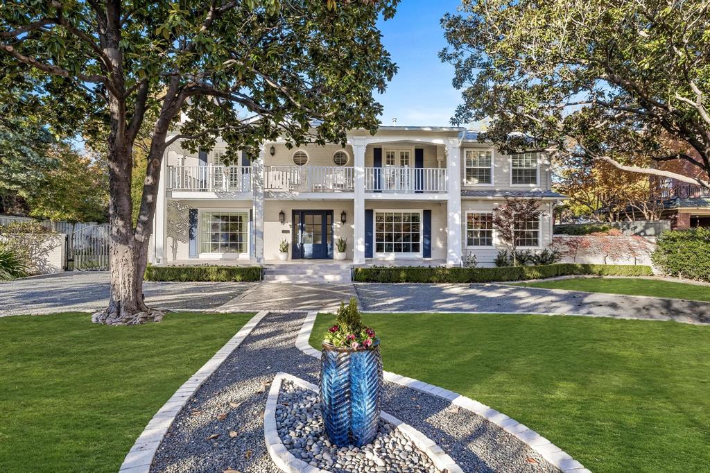 Discover this stunning home nestled on nearly half an acre of beautifully manicured grounds, complete with a pool, spa & greenhouse. This elegant residence features a main house with 3 bedrooms, 2.5 baths & 3 spacious living areas alongside a formal dining room. The heart of the home is the amazing kitchen, boasting a large island, custom cabinetry, granite counters & high-end appliances, including a built-in refrigerator. A separate bar area with a beverage fridge adds a touch of luxury. The master suite offers dual closets, a sitting area & an en-suite with double vanities, a shower & a tub. Additionally, there's a beautiful guest suite with a full kitchen, bedroom, bathroom & home gym. The property also features a grand circular driveway & sprawling double porches, creating a welcoming Southern charm. Just minutes from Lakewood Elementary, downtown & Lakewood Country Club, this home offers an unparalleled blend of elegance & convenience Sq Ftg does not include guest house of 1029 ft