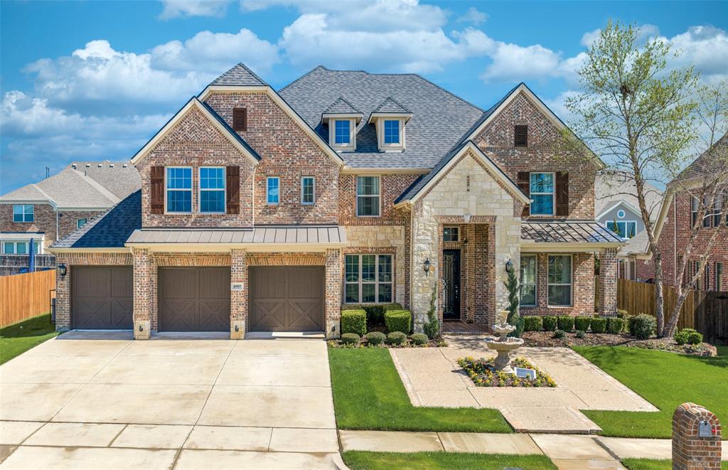 This stunning former model home offers 5 bedrooms, 4 bathrooms, 3,940 square feet, and a 3-car garage, showcasing exceptional upgrades, designer finishes, and a thoughtfully designed layout. From the moment you arrive, the home impresses with beautiful brick-and-stone curb appeal, professional landscaping, and a charming front-yard fountain feature. Inside, rich wood flooring flows throughout the main living areas, complemented by designer lighting, elevated trim work, and model-home quality finishes. A private office with French doors sits near the entry, offering an elegant workspace with under stair storage. The open-concept floor plan leads to a spectacular kitchen featuring quartz countertops, stainless steel appliances, a gas cooktop, butler’s pantry, and walk-in pantry, all overlooking the spacious living room with a cozy fireplace. The primary suite is conveniently located on the main level and offers generous space, abundant natural light, and direct access to the backyard oasis. The spa-inspired primary bath includes dual sinks, a large glass-enclosed shower, and a relaxing soaking tub. Upstairs, entertainment and comfort continue with a game room and fully equipped media room featuring tiered seating, 100” projection TV, dry bar, and built-in wine cooler - perfect for movie nights. Four additional bedrooms are located upstairs, including two connected by a Jack-and-Jill bath, plus another full bathroom. All secondary bedrooms feature walk-in closets and spacious layouts. Step outside to your private backyard retreat with a beautiful pool, covered patio, and landscaped yard, creating the perfect setting for relaxing or entertaining. Located in Bower Ranch, residents enjoy a quiet, upscale neighborhood with convenient access to top-rated Mansfield ISD schools, shopping, dining, and major commuting routes, all while maintaining a peaceful suburban atmosphere.