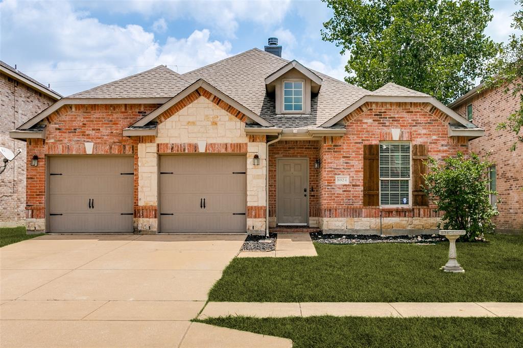 Welcome to this beautifully maintained 3-bedroom, 2-bath home in the desirable Parks at Boat Club community! Designed with both comfort and functionality in mind, this inviting home features an open-concept floor plan that seamlessly connects the spacious living, dining, and kitchen areas, making it ideal for everyday living and entertaining. The large living room showcases beautiful wood flooring and a stunning stone wood-burning fireplace that serves as the focal point of the space. The well-appointed kitchen offers abundant built-in cabinetry, generous counter space, and plenty of storage for all your cooking and organizational needs. The private primary suite is thoughtfully separated from the secondary bedrooms and features a spacious bedroom, oversized walk-in closet, dual sinks, a relaxing garden tub, and a separate shower. The split-bedroom layout provides added privacy and flexibility for family members or guests. Step outside to enjoy the large grassy backyard complete with a patio perfect for outdoor dining, entertaining, or simply relaxing. A brick privacy fence creates a peaceful setting for enjoying the outdoors. Additional features include a 2-car garage and access to the neighborhood's outstanding amenities, including a community pool and playground. Conveniently located near shopping, dining, schools, and major commuter routes, this home offers the perfect combination of comfort, convenience, and community living. Don't miss this wonderful opportunity to make it yours!