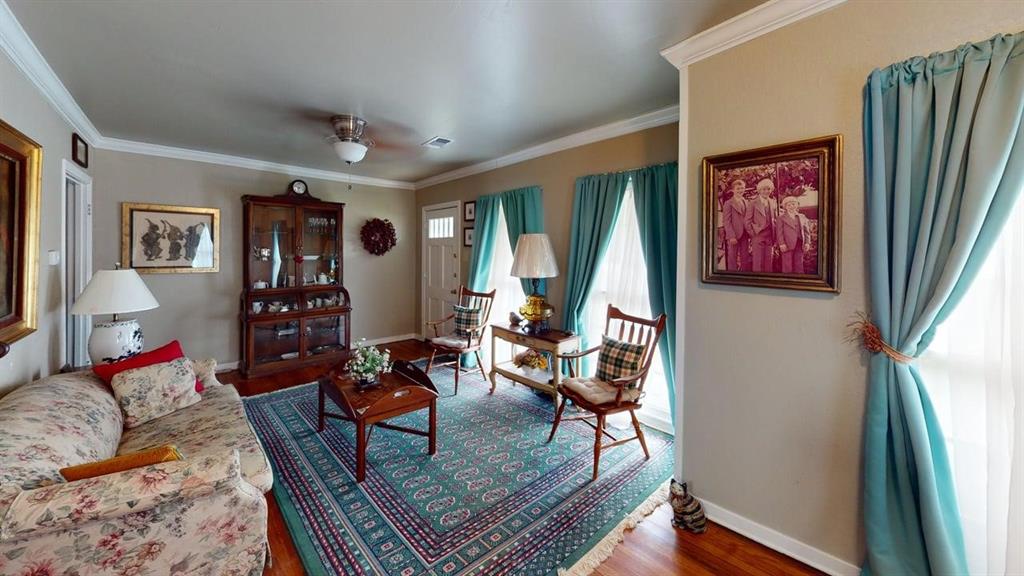 Step into timeless charm with this beautifully maintained 2 bedroom, 1.5 bath home built in 1965. Blending classic character with thoughtful modern updates, this inviting property offers the best of both worlds. Original hardwood floors add warmth and authenticity throughout, while updated features provide comfort and convenience for today's lifestyle.

The home's cozy and welcoming atmosphere showcases the craftsmanship, creating a space that feels both elegant and comfortable. Outside, you'll find a single detached garage along with multiple storage buildings, offering plenty of room for tools, hobbies, and extra storage.

Filled with character and enduring style, this lovely home is a rare opportunity to own a piece of timeless charm with modern-day functionality.