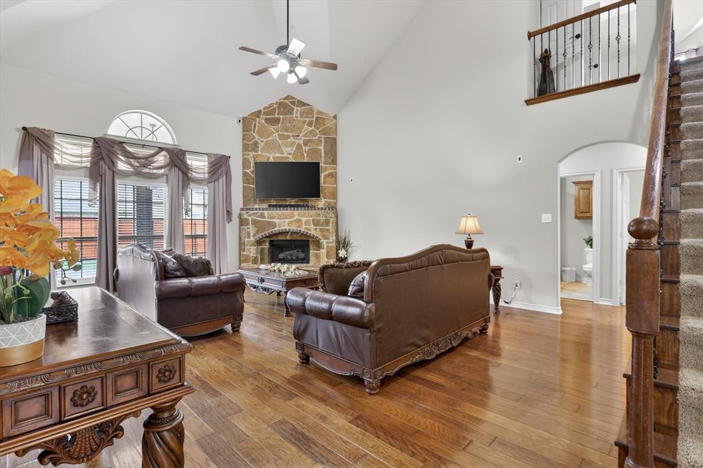 Located in the highly desirable master-planned community of Marine Creek Ranch, this beautifully maintained 5-bedroom, 4-bathroom Fort Worth home offers the perfect combination of space, entertainment, and convenience. Situated near Eagle Mountain Lake, Naval Air Station Joint Reserve Base Fort Worth, shopping, dining, and major highways, this move-in-ready home is zoned to Eagle Mountain-Saginaw ISD. Designed for modern living, the spacious floor plan features multiple living areas, including a formal living room, private home office, oversized game room, dedicated media room with projector, screen, surround sound, stadium seating, and a dry bar, plus an open-concept family room ideal for entertaining. The kitchen flows seamlessly into the breakfast area and main living space and features a 5-burner gas cooktop, double ovens, abundant cabinet space, and a functional layout perfect for everyday living and hosting. The formal dining room provides additional space for holidays and gatherings. The oversized primary suite features a spa-like ensuite bath with a jetted tub, separate shower, and large walk-in closet. Generously sized secondary bedrooms provide flexibility for guests or multi-generational living. Enjoy outdoor living with covered front and back patios, an extended back patio, a new roof, professionally landscaped front flower beds, and excellent curb appeal. Sellers are also offering a one-year home warranty plus $2,500 in buyer concessions that can be used towards closing costs, carpet allowance, an interest rate buydown, etc. Marine Creek Ranch residents enjoy access to scenic walking and biking trails, a gated waterfront area with fire pits and dock access on Marine Creek Lake, community pools, parks, and popular neighborhood events throughout the year. This Fort Worth home truly offers space, lifestyle, and community all in one! Buyer and buyer's agent are responsible for verifying all information, including schools and HOA information.