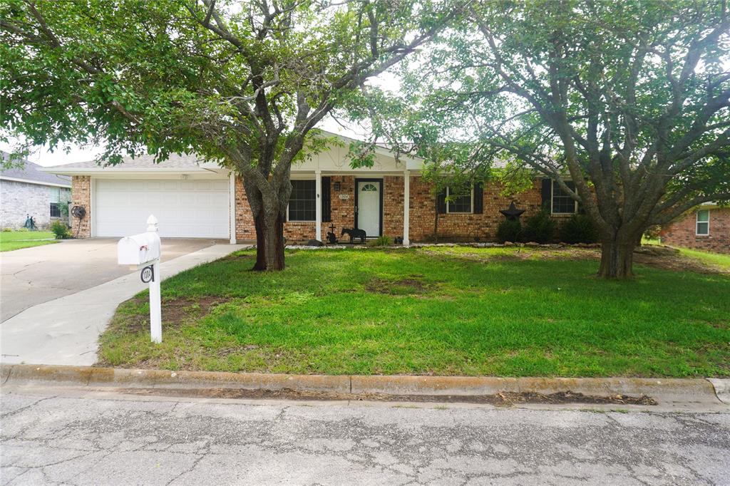 Charming and well-maintained 3-bedroom 2-bath brick home offering comfortable living space with thoughtful updates throughout.  Step inside to find durable vinyl flooring, attractive wood blinds, and updated lighting that enhances the home's warm and inviting atmosphere.  The kitchen features a new dishwasher, while both bathrooms have been refreshed with new cabinetry and updated light fixtures.  Additional improvements include upgraded garage lighting, a motion-activated security light above the garage, and new gutters installed along the east side of the home.  Outdoor living is a standout feature with a spacious covered patio complete with dual ceiling fans, creating the perfect setting for relaxing evenings, outdoor dining, or entertaining guests.  The backyard also includes a convenient storage building for tools, equipment or hobby space.  For added piece of mind, the home is equipped with exterior floodlights and a composition roof installed in August 2025.  This move-in-ready property combines comfort, functionality, and valuable updates, making it an excellent place to call home.