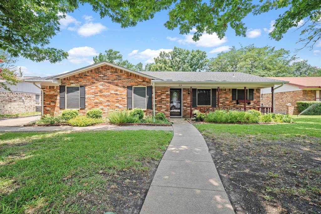 Charming and move-in ready, this delightful 3-bedroom, 2-bath home in the heart of Waxahachie blends classic character with thoughtful updates. A welcoming living area centers around a cozy fireplace, while one bathroom offers a convenient handicap-accessible shower. Mature, beautiful trees grace the front yard, providing instant curb appeal and shade. Practical features include a rear-entry garage, a covered back patio perfect for relaxing or entertaining, and an excellent storage shed for tools and seasonal items. Well-maintained and full of warmth, this home offers comfortable, convenient living in a central Waxahachie location.
