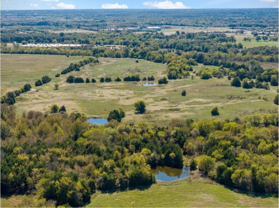 Known historically as The Knight Ranch, this beautiful acreage has been passed from one generation to another since 1877 and is now being offered for sale! Currently in agricultural exemption, this land has been cultivated for crops and hay in past years. Cattle have grazed the property and recently been relocated. The land has been used as a recreational hunting property for deer and hogs by the owners. Property perimeter is barbed wire and is cross-fenced. Mature trees and wildlife abound. Enjoy country living just 2 miles from downtown Commerce and outside of city limits and a 1 hour drive from downtown Dallas. Opportunities for this property abound including making it a homestead, a working farm or ranch, subdividing for multiple properties, or developing for residential or commercial use.