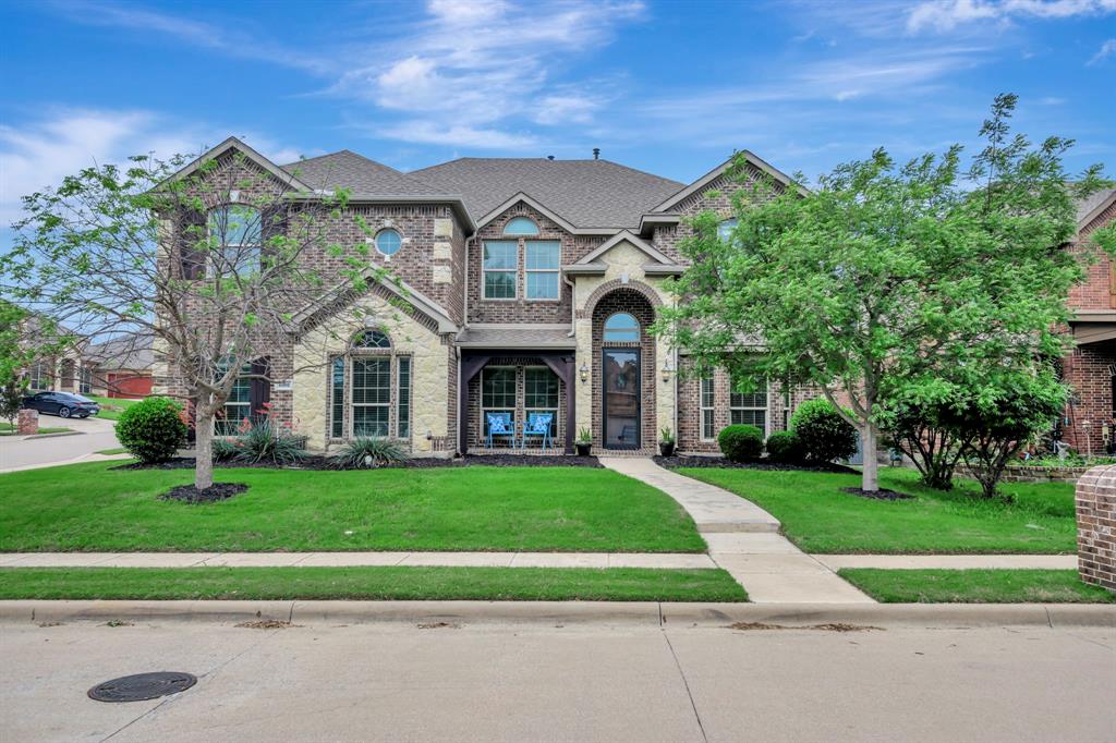 Step into a beautifully designed home that blends space, style, and functionality on an oversized corner lot. The main living area impresses with soaring vaulted ceilings and a stunning floor to ceiling stone fireplace, creating a warm and inviting focal point. A striking spiral staircase with natural wood trim, iron railings, and a catwalk adds architectural character and visual appeal. The spacious kitchen is perfect for both everyday living and entertaining, featuring granite countertops, an island with two tone cabinetry, a breakfast bar, gas cooktop, butler pantry, and a large walk in pantry. Wood looking ceramic tile flows through the main living areas for durability and style.
The primary suite is a true retreat with trayed ceilings, crown molding, dual vanities, a separate shower, jetted tub, and a custom walk in closet. Most secondary bedrooms include walk in closets, and the home offers multiple linen closets and abundant storage throughout. A functional mudroom with a built in bench, cubbies, and hanging space keeps everything organized. The garage includes an extended storage area in addition to parking. Upstairs, the media room is ready for movie nights with a snack bar, mini fridge, and raised seating platform. Enjoy outdoor living on the large covered patio, perfect for relaxing or entertaining. Conveniently located near Chisholm Trail Parkway, shopping, and the elementary school, this home offers thoughtful details and flexible spaces designed to fit a variety of lifestyles. Call today to schedule a private showering!