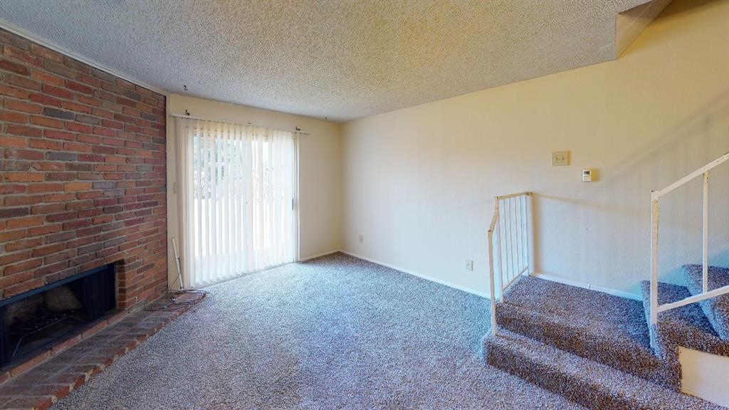 See Virtual tour! Bright and open 2-story townhome with a lovely brick fireplace, spacious bedrooms, and lots of closet space. Both bedrooms are upstairs. Small backyard for pets or kids. Tenant occupied till May 31st, 2026 at a rent rate of $1,155.