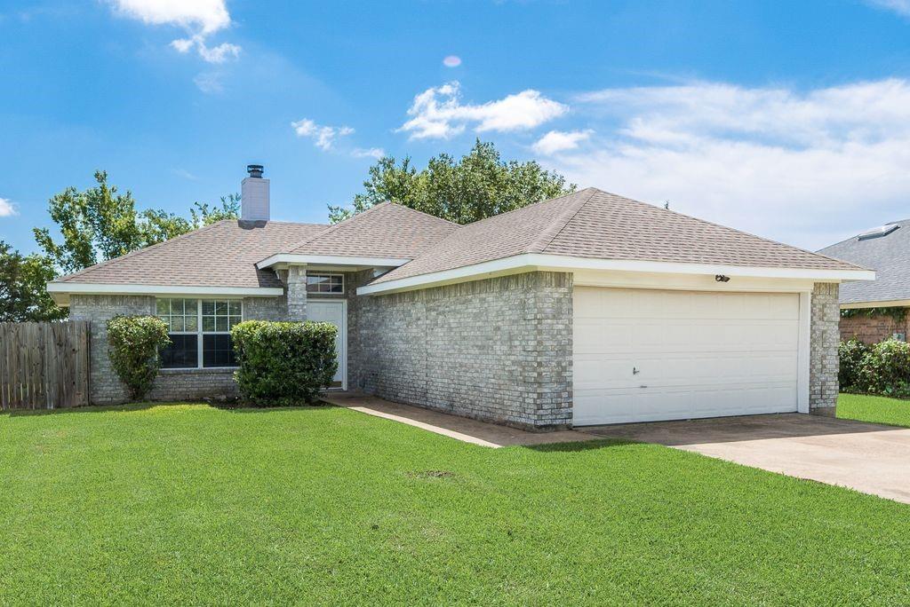 Welcome home to this cute, move-in ready 2 bedroom, 2 bath brick home with 2 car garage, open floor plan with wood burning fireplace and private fenced in backyard-perfect for relaxing or entertaining.
