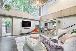 Beautiful loft style 2 story condo with lots of natural light, soaring vaulted ceilings and a large ground floor patio with a private entrance. The building has a rooftop resort style pool and amazing views of the Dallas skyline, spa, two outdoor gas grills, a fire pit, and a covered space for lounging.  There is a large dog park across the street and a dog potty park on the property site as well. This community has an abundance of restaurants, coffee shops and bars within a few blocks.