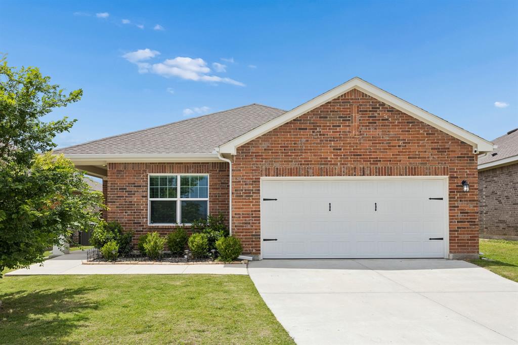 Welcome to this beautifully maintained north-facing home offering an open-concept layout, thoughtful upgrades, and exceptional privacy with no rear neighbors. Situated in highly desirable Northwest ISD, this move-in ready 3-bedroom, 2-bath home combines comfort, functionality, and value in one of Haslet’s fastest-growing areas.

The spacious kitchen features granite countertops, white painted cabinetry, stainless steel appliances, and seamless flow into the living and dining spaces—ideal for both entertaining and everyday living. Natural light fills the home, while upgraded finishes throughout create a polished and elevated feel.

Since purchasing, the owners have invested in numerous valuable upgrades including ceiling fans throughout, blinds throughout the home, full gutters, and an electric vehicle charger in the garage—features many nearby new construction homes do not include.

Enjoy a large backyard with added privacy thanks to no homes directly behind the property, creating the perfect setting for relaxing evenings, pets, play, or future outdoor living enhancements.

The community offers scenic greenbelts, walking trails, multiple ponds, playground, and a resort-style splash park, all conveniently located less than one mile from Highway 287 for an easy commute.