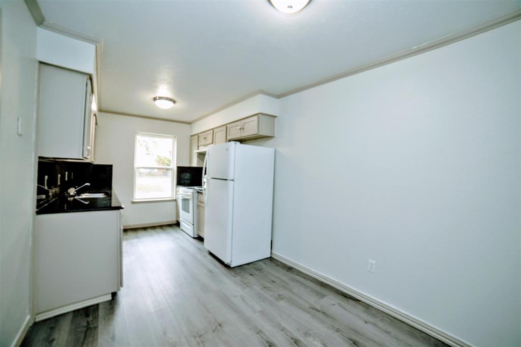 Lovely updated 2 story 4 bedroom, 2.5 bathroom townhome with cozy backyard, granite kitchen counter tops, new paint, new laminate wood floors, new carpet, fence (Oct. 2022), energy efficient windows (June 2019), HVAC (May 2020)., Carport (Oct 2022), roof (May 2017)

No HOA.

Buyer will need to purchase a new survey as Carport has been added.
