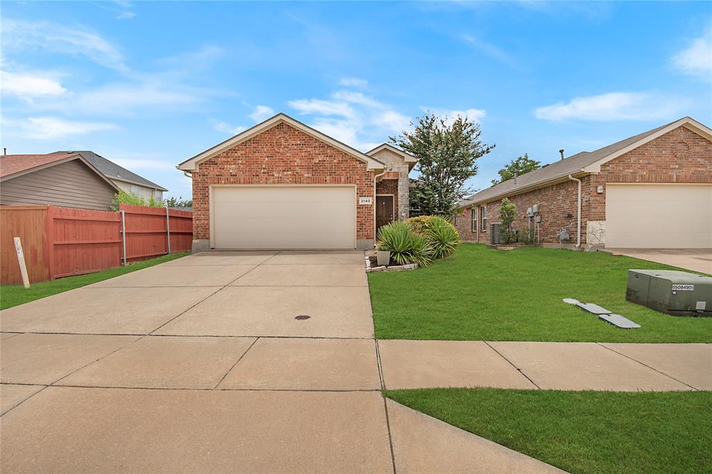 Welcome to 2140 Sweetwood Drive, a well-maintained 3-bedroom, 2-bathroom home in Eagle Mountain-Saginaw ISD offering 1,372 square feet of comfortable living space. The open-concept floor plan creates an easy flow between the living, dining, and kitchen areas, making the home functional for both everyday living and entertaining. The split-bedroom layout provides added privacy for the primary suite, while two additional bedrooms offer flexibility for guests, a home office, or growing families. Step outside to a covered back patio overlooking the backyard, an ideal space for relaxing or hosting. The home also includes a 2-car attached garage. Recent improvements include updated living room flooring, roof (2023), HVAC system replaced (2023), and an updated dishwasher (2024). Located in an established HOA community with a neighborhood pool and park, this home is just minutes from shopping, dining, and major highways, offering convenience with easy access throughout Fort Worth.