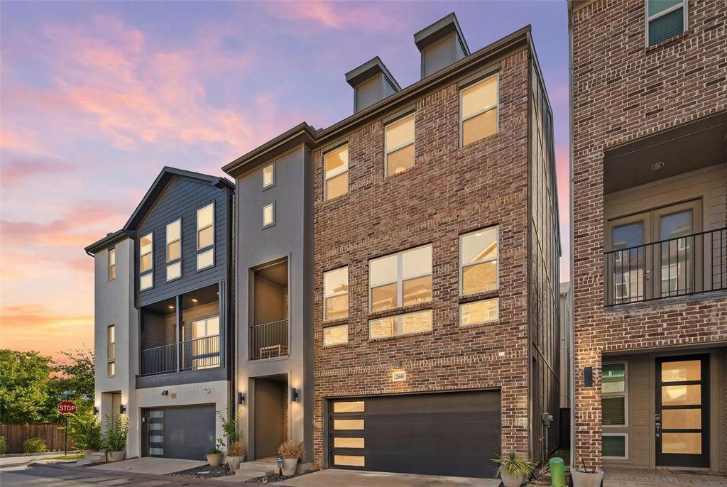 Discover elevated city living in the heart of Trinity Groves with this beautifully designed three-bedroom, three-and-a-half-bath contemporary townhome offering modern luxury, low-maintenance living, and an unbeatable Dallas location. Featuring one of the more spacious and functional layouts in the community, this home is perfect for busy professionals, frequent travelers, or anyone seeking the convenience of an effortless urban lifestyle.

Thoughtfully designed with privacy in mind, each spacious bedroom features its own private ensuite bath and walk-in closet, creating an ideal layout for guests, roommates, or flexible living arrangements. The open-concept design is filled with natural light and seamlessly connects the expansive living, dining, and kitchen spaces, creating the perfect setting for both entertaining and everyday living.

At the center of the home, the chef-inspired kitchen makes a statement with an oversized island, sleek modern cabinetry, stainless steel appliances, designer finishes, and abundant prep and storage space. The spacious primary suite offers a spa-like retreat featuring dual vanities, a freestanding soaking tub, a separate walk-in shower, and generous closet space.

Additional highlights include a private balcony, attached two-car garage, low-maintenance turf yard, and thoughtfully designed spaces that prioritize both comfort and convenience.

Residents enjoy exclusive access to SoHo Square’s luxury amenities including a resort-style pool, fitness center, game room, golf simulator, and private bowling alley. Ideally located just minutes from Trinity Groves, Downtown Dallas, Bishop Arts, and major highways, this home offers the perfect blend of modern luxury, convenience, and vibrant city living.