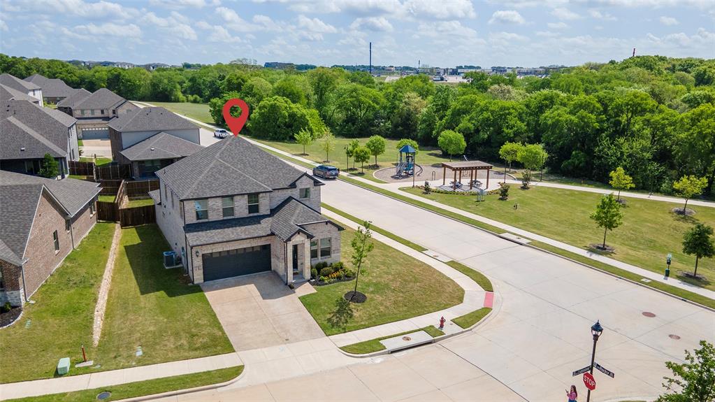 PRICE IMPROVEMENT – NOW $499,000! Why wait months for new construction when you can move into a beautifully maintained 2023 home on one of the largest lots in its price range today? Situated on a rare 2010-acre corner lot directly across from the neighborhood pond, playground, and walking trails, 1504 Cobblestone offers a combination of location, lot size, condition, and value that is increasingly difficult to find in Melissa. Among homes built in 2020 and newer with similar lot sizes, this is one of the lowest-priced opportunities currently available. Even better, builder warranties are still in place, giving buyers peace of mind without the uncertainty, delays, and added expenses often associated with new construction. Inside, the thoughtfully designed floor plan offers the flexibility today's buyers demand. Just off the entry, a private first-floor flex room provides the perfect space for a home office, study, playroom, fitness room, or second living area. The open-concept living, dining, and kitchen spaces create an inviting atmosphere for everyday living and entertaining, centered around a large island, stainless steel appliances, abundant cabinetry, and generous counter space. The first-floor primary suite offers privacy and comfort, featuring dual vanities, an oversized walk-in shower, and a spacious walk-in closet. Upstairs, you'll find three additional bedrooms, a full bath, an expansive game room, and a versatile loft area that can easily serve as a media room, study zone, workout space, or additional living area. Step outside to a covered patio overlooking a large fenced backyard with plenty of room for a future pool, outdoor kitchen, garden, playset, or simply a space to enjoy the beautiful Sunsets. Located just minutes from Highway 75, the new H-E-B, Buc-ee's, McKinney, Allen, and Frisco, this home delivers the perfect balance of small-town charm and everyday convenience. Large lot. Prime location.  Remaining builder warranties. Exceptional value.