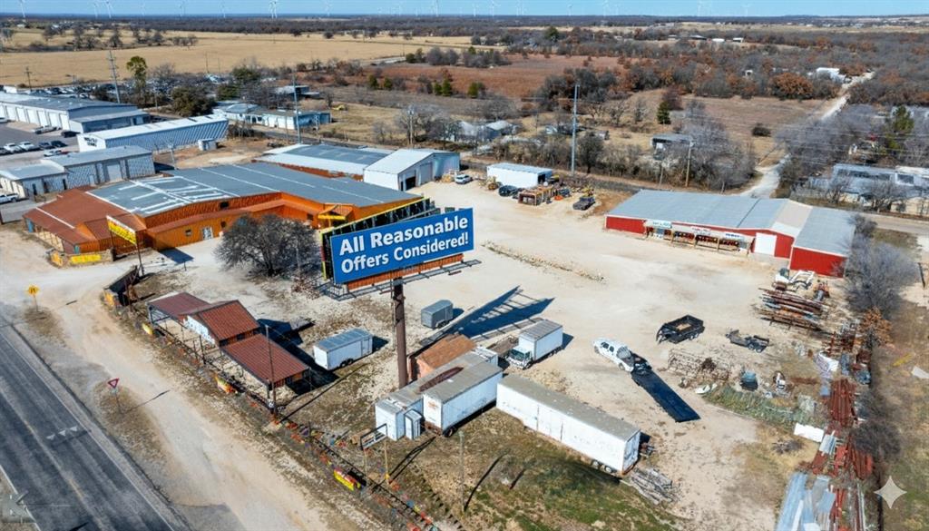 ALL REASONABLE OFFERS WILL BE CONSIDERED!  POSSIBLE OWNER FINANCE! POSSIBLE LEASE! Nestled on a sprawling 3.16-acre plot with ample frontage on Interstate 20, this impressive furniture store offers an expansive 40,710 square feet spread across three buildings, all in excellent condition. The property is versatile, making it an ideal choice for a range of businesses. With plenty of parking available, the property is well-suited for high-traffic ventures. The sprawling space and strategic location make it an ideal candidate for various purposes: •Church: The vast internal space can be transformed into a sanctuary, fellowship halls, and classrooms, making it perfect for a growing congregation. •Retail Space: The property's layout and location offer great potential for a large retail store or shopping center, attracting customers from the bustling Interstate 20. •School: With ample space for classrooms, administrative offices, and recreational areas, this property could be converted into an educational facility.•Car Dealership: Featuring a giant showroom, this property is perfect for displaying a wide range of vehicles, along with service and maintenance facilities. •Production Facility: The ample square footage and multiple buildings provide a great environment for manufacturing or production operations.•Travel Center: Given its extensive frontage on Interstate 20, this site is advantageous for developing a large travel center, catering to the needs of travelers with services, amenities, and convenience. This property represents a unique and versatile investment opportunity with its strategic location, ample space, and excellent condition. Don't miss out on the chance to transform this property into a thriving business hub.