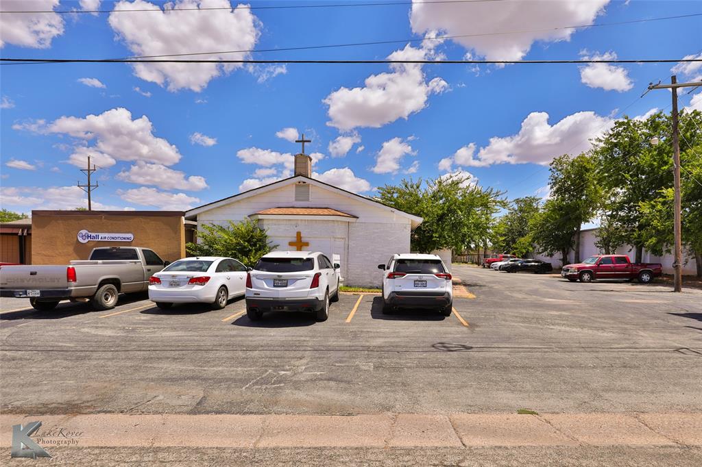 Great Location, center of the city. This property has been well maintained and ready for new owners. A nice structure with high ceiling in the main area. The original owners used this building for a Church congregation. This property is move in ready. Foyer in the side entrance and back entrance. Nice and very well-kept medium size sanctuary that boasts a stage, baptistry, storage rooms, extra rooms used as classrooms. Upstairs loft used as classroom and storage space. Large room used as clergy office. Outside storage unit in back. Huge asphalt parking lot in back of structure. This building can be used for commercial use as well.