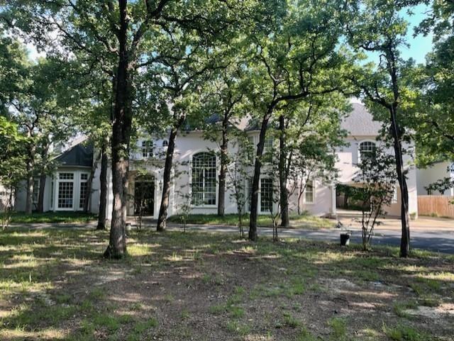JUST REDUCED $200,000!!!  Huge Home with Custom Finish Out* Amazing over 11,600 + Sq. Ft. * 8 Bedrooms, 9 Baths and 4 Car Garage in the Main House* Two Out Buildings with Total of 4 Bedroom apartments* Over 1.2 Acres* Easy To Show* Sparkling Pool and Spa* Two Kitchens in the Main House and One Big Kitchen in one of the Out Buildings* Parking for at least 20 Cars* Master Down with Huge Bathroom* Large Library with WBFP* 3 Fireplaces* Bring Your Buyers and Offers!!! Call Agent for all showings.