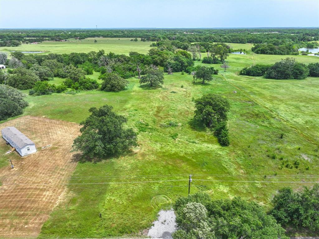 Nestled in the serene countryside of Miller Grove, TX, this breathtaking 3-acre lot offers the perfect balance of tranquility and opportunity. Whether you're looking to build your dream home, bring in a manufactured home, or invest in a slice of Texas charm, this property is a rare find.
Surrounded by rolling landscapes and mature trees, the spacious lot provides ample room for a custom-built residence, outdoor recreation, or small-scale agriculture. Its generous size ensures privacy while remaining conveniently close to essential amenities and major roadways. With no restrictions, the possibilities are endless—create a peaceful retreat away from the hustle and bustle of city life.
Electricity and water are readily available, making development seamless. Located within the highly regarded Miller Grove ISD, this property offers access to excellent schools and a welcoming community. Whether you're setting down roots or seeking a quiet getaway, the area boasts a friendly atmosphere and a deep sense of local pride.
This prime piece of land is more than just real estate—it's an investment in a lifestyle. Imagine waking up to the sounds of nature, enjoying wide-open spaces, and embracing the freedom that comes with owning land in the heart of Texas. Don't miss this incredible opportunity to turn your vision into reality!