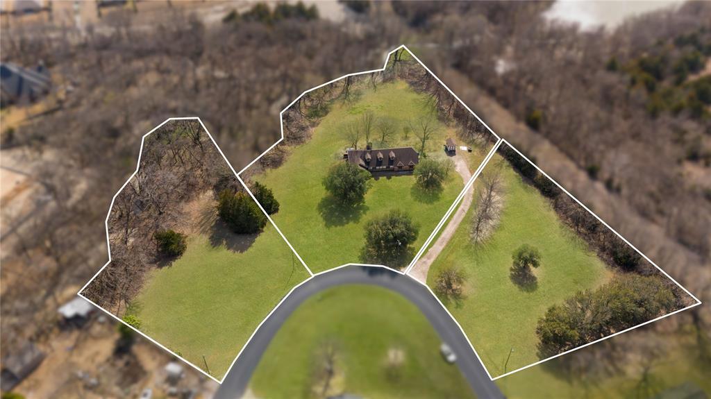 Rare opportunity in rapidly growing Anna, Texas in the prestigious private golf course community of Hurricane Creek! Three contiguous parcels totaling 4.828, making up a massive corner lot, backing to trees for privacy, with an existing 4-bedroom, 3-bath home. Tucked away on a quiet circle and backing to a seasonal creek, this property offers exceptional privacy, mature trees, and wide-open space while remaining minutes from US-75, McKinney, Melissa, Denison, Sherman, Frisco, McKinney, and North Dallas commuting routes. The home provides a functional layout and is ideal for renovation, expansion, or a future custom build. With no dense subdivision behind you, enjoy peaceful country living, room for horses, workshops, RV storage, or additional structures (buyer to verify restrictions). Bring your vision as this home is fairly original to its construction in 1982, great bones just needs to be brought up to 2026. Located in one of Collin County’s fastest-appreciating corridors, this property combines acreage, utilities in place, and strong long-term investment potential. Perfect for buyers seeking a private estate, multigenerational setup, or land for redevelopment near the path of growth. Hard-to-find small acreage tract with creek frontage inside Anna city limits, opportunities like this are increasingly scarce. Minutes from Home Depot, shopping, grocery stores, HEB, and entertainment.