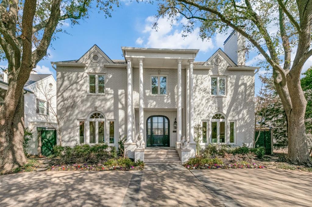 Nestled in a prime location at the northern entrance of Volk Estates, this meticulously remodeled home offers the perfect blend of traditional elegance and modern sophistication. Set on an oversized lot, the home’s open-concept floor plan spans three stories with 4 bedrooms and 3 full & 2 half baths, including a third-story game room-media-study. The residence boasts 10-foot ceilings on the first floor and 9-foot ceilings on the second and third, providing a sense of spaciousness throughout. Every detail has been thoughtfully updated, including beautiful hardwood floors across all levels and three inviting fireplaces that add warmth and charm. The chef’s kitchen is a true highlight, featuring high-end appliances and an expansive breakfast room overlooking the lush backyard, perfect for entertaining. The spacious dining room, formal living room with fireplace, powder bath, wet bar, and family room with fireplace complete the first level.  On the second level, the enormous primary suite is a tranquil retreat with its own fireplace and spa-like bath with oversized closet, while the three additional bedrooms all offer thoughtfully updated ensuite baths and generous closet space. The luxurious third-floor space is ideal for a game room or private office, offering flexibility to suit any lifestyle. Situated on a private, limited-access alley shared with just two other homes, the property offers secure, direct access to Amherst Avenue and is within walking distance to UP Elementary School, making it ideal for families. The home is also steps from Curtis Park, where residents can enjoy walking trails, a serene lake, a pool, and tennis courts. With numerous recent upgrades, including new HVAC units, a tankless water heater, Tesla chargers, and a new back driveway electric gate (to name only a few), this home is an extraordinary blend of luxury, functionality, and convenience, offering unparalleled value in one of Dallas' most coveted neighborhoods.