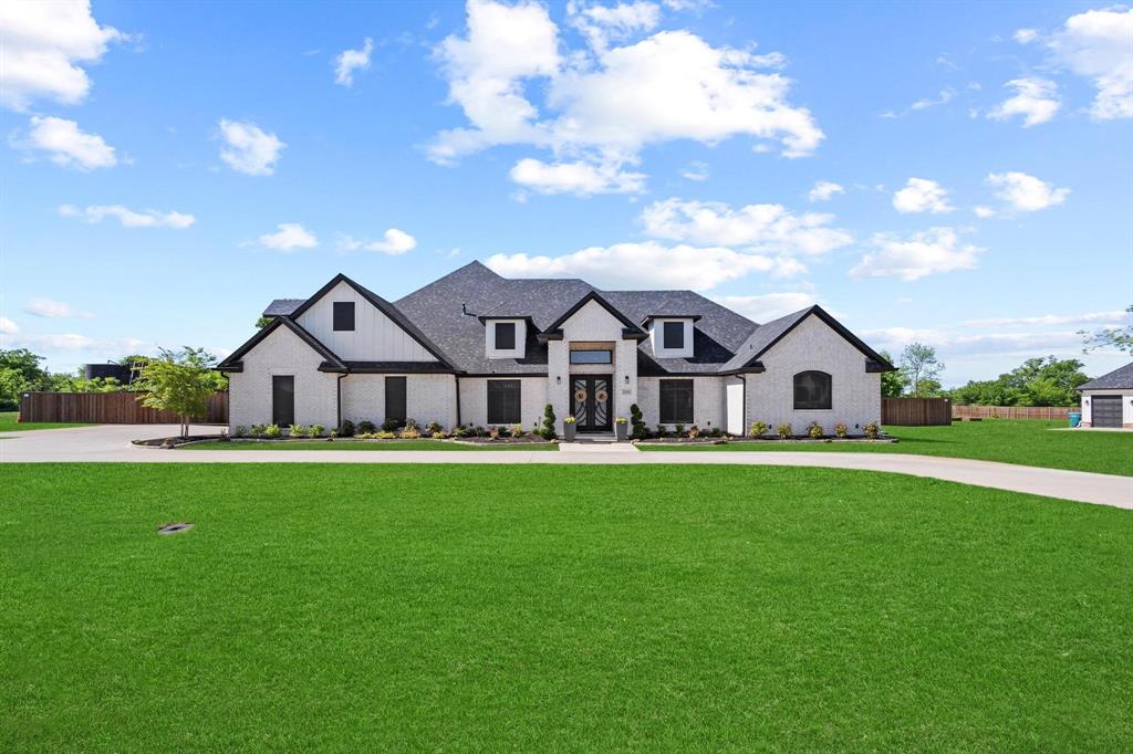 Situated on over an acre in one of West Sherman’s most desirable areas, this custom home offers over 4,600 sq ft of combined living space between the main residence and a fully finished guest quarters—all with no HOA. The main home features 4 bedrooms, 3 bathrooms, and a spacious, thoughtfully designed layout. Inside the main home, enjoy a dedicated office, large game room, and a luxurious master suite featuring dual closets and a stunning bathroom with heated floors. This house offers high-end finishes including quartz countertops, custom shutters, automatic window shades, and smart switches to easily control lights and fans from your smartphone. Built with efficiency in mind: spray foam insulation, solar screens, high SEER HVAC, tankless water heater, and fiber optic internet. The oversized 3-car garage includes a 220 plug for your electric vehicles. Out back, enjoy the fully finished guest quarters offering nearly 700 sq ft of additional flexible living space, complete with a full bathroom, bar sink, ice machine, and a convenient pull-down Murphy bed—perfect for guests, private living, or entertaining. OVER 1,000 sq ft of garage and shop space providing ample room for hobbies, storage, or a home workshop. The large fenced back yard offers plenty of room to add a pool, outdoor living area, the possibilities are endless. Enjoy the short walk to Pecan Grove Lake, Park, baseball and soccer fields. This one-of-a-kind custom home is packed with upgrades, space, and flexibility. Come make it yours.