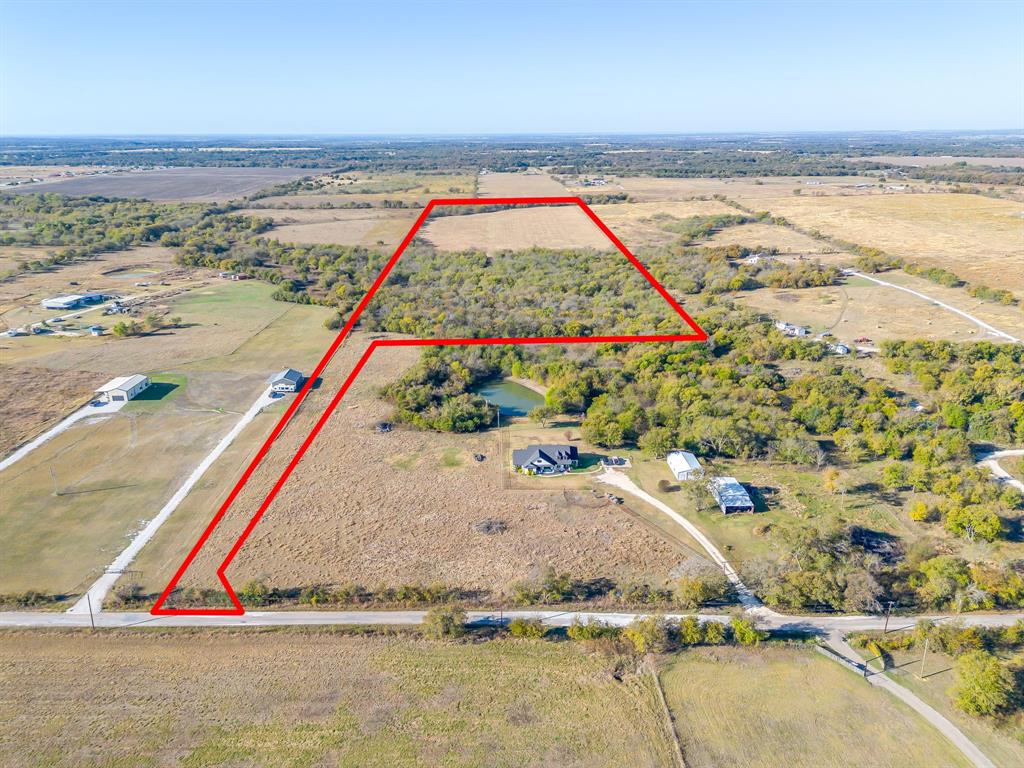 Discover 39± acres of prime Texas land in the highly sought-after Grandview ISD. This beautiful property offers the perfect blend of open space and natural beauty, featuring a picturesque creek that winds through the land and adds character, attracts wildlife, and offers charm.  Enjoy the best of both worlds with mature, established trees on part of the property—ideal for shade, or privacy —while the remaining acreage provides open pasture, perfect for grazing, hay production, or future homesites. The majority of the perimeter is already fenced, giving you a great head start for livestock or securing the land.  Whether you’re looking to build your dream home, create a weekend retreat, run cattle, or invest in land in a top-rated school district, this Grandview property checks every box. Peaceful country living with endless possibilities—come make it yours.