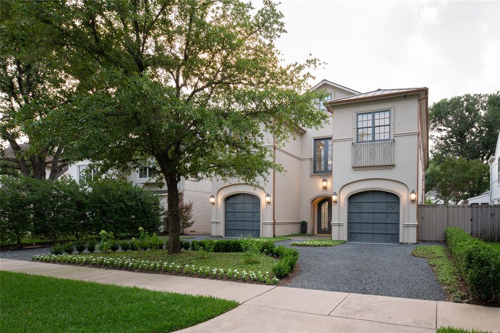 Sophisticated and renovated, this chic and transitional 5 bedroom Highland Park home is walking distance to both HP Village and Bradfield Elementary in HPISD. With the feel of a European townhome and updated with the highest quality finish-out, and features including pier & beam foundation, a great flow, ample natural light, 11’ ceilings, and updated spaces. Downstairs is a spacious entry, formal living and dining, bar or office with built-ins and open kitchen to living with fireplace. All Viking & Bosch appliances in the kitchen, 2 dishwashers, 2 warming drawers, gas cooking, chilled wine and ample storage. Upstairs includes primary suite with sitting area and fireplace, spacious bath, coffee bar & dual closets, 2nd office with locking filing drawers, casual living & two secondary bedroom suites. 3rd floor includes two bedroom suites and kitchenette. Outdoor pool and turfed lawn complete this move-in-ready home in an A+ location! Two private & oversized garages offer 13' ceilings.