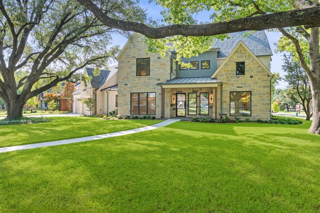 WOW!  Incredible Custom Home located in The Reservation of Richardson!  New Construction, beautifully landscaped, large corner lot with HUGE mature trees.  Short walk to Mohawk Elementary, JJ Pearce High School and Mimosa Park.  Home features include 8 inch wide oak woods floors, quartz countertops, open concept design with high ceilings, abundant storage, 5 spacious bedrooms (2 downstairs and 3 up) each featuring its own private bath and walk-in closet with built-ins.  Additional full bath down could also be a pool bath, making a total of 6 full baths. Game room up. Private master suite offers a huge walk-in closet and elegant master bath with free standing tub and separate shower. Deep oversized garage with 9ft doors and large driveway offers plenty of parking.  Beautiful gourmet (eat-in) kitchen features Wolfe and Subzero appliances and large walk in pantry.  High-efficiency HVAC with Nest, class 4 roof with standing seam accents, spray foam insulation, wifi appliances and garage doors openers.  Large, covered front and back porches finished with Bluestone.