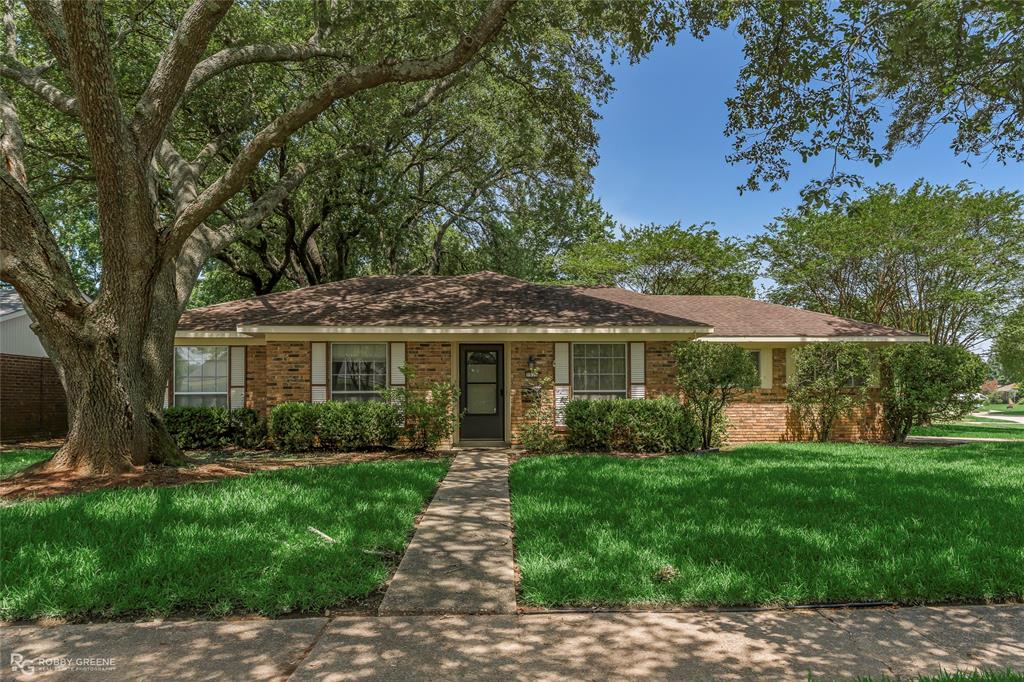 Cute and charming brick home on a large corner lot in Bellaire Subdivision! This 3-bedroom, 1.5-bathroom home has so much potential! The mature trees, well-maintained landscaping, and lovely brick exterior welcome you as soon as you arrive. With a formal living room and formal dining room, this property has plenty of space for entertaining. The kitchen features modern appliances as well as a breakfast nook for more casual meals. The spacious family room offers a relaxed spot to unwind after a long day, with plenty of natural light and a cute brick fireplace. The sunroom off of the formal living area allows you to enjoy the peaceful backyard from a comfortable spot - the perfect place for your morning coffee! Boasting a full privacy fence, spacious equipment shed, and plenty of room for a garden, the serene backyard is sure to be a favorite feature of this property. Additionally, a new water heater was installed in May, new AC in 2015, and a new roof in 2013 giving you peace of mind. Conveniently located just minutes from BAFB as well as shopping and dining, this home isn't one to miss - scheduled your tour today!