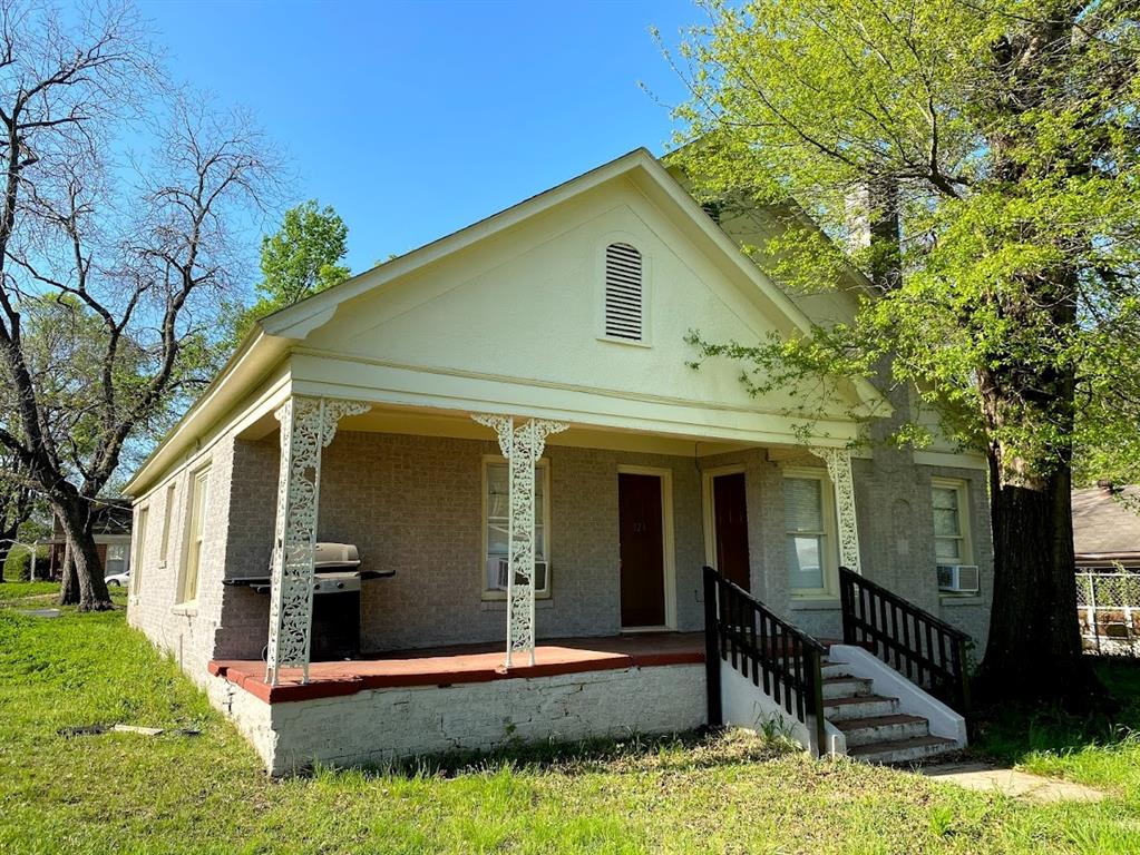 Calling all investors! This tenant-occupied property includes two homes sitting on a corner lot near downtown Tyler for a total of three (possibly four bedrooms) and two bathrooms! The main home has two bedrooms, one bathroom and a second living area that could be converted into a third bedroom. A new roof was installed in 2020. On the Pabst Street side of the property sits a 500-square foot studio or guest house that recently renovated. Both homes can be easily accessed from the shared driveway behind the main home. Gross rent of $1750 per month. This is a great opportunity to add to your rental portfolio!