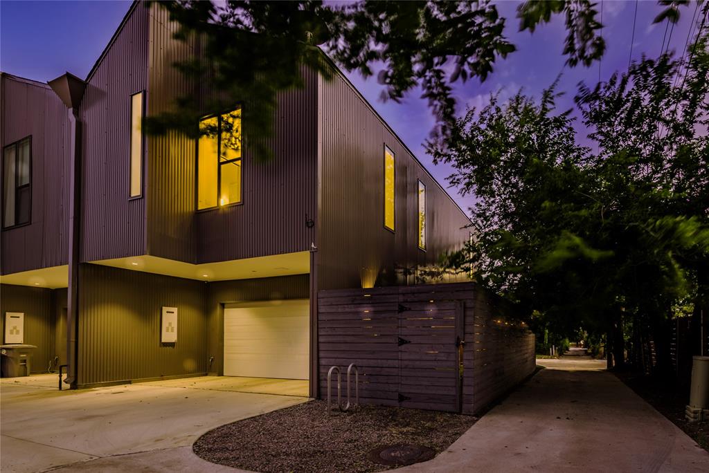 ZERO down convl loan available, NO PMI. This modern detached home, designed by renowned architects Far+Dang, transcends typical design topologies in this 2-story corner lot condo, featuring museum-finish walls, innovative design, and bending natural light through interior glass panels to seamlessly fill each space. Three and four-story residences are the norm in Dallas, it's rare to find a two-story walk-up, pointedly crafted with elevated touches, it truly stands apart. This corner home boasts a private yard with permeable patio, owners 2 car garage with driveway, detached non-shared walls, pivot-hinged solid-core doors, energy-efficient features, integrated surround sound, custom rolling shades, a smart home system, white oak nail down hardwood floors, soaring 10-15’ ceilings, abundance of windows providing natural light and more. The first level includes a bedroom with an en-suite bathroom and a spacious under-stairs closet. The second level features the master suite with an en-suite bathroom, laundry room with full sized washer and dryer included, large storage closet, half bath, and open living areas (including kitchen, dining and living). Outside, a 9-foot modern cedar fence encloses a generous side yard with a lighted permeable patio and pet-grade artificial turf for epic entertaining. Additional parking is available in the rear private driveway, as well as free street parking in the front. Fridge, W&D stay.