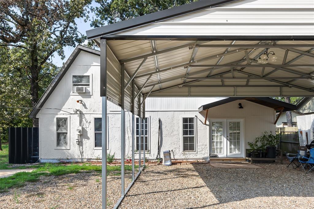 This Beaqutiful one of a kind house doesn't come available very often! it's located in Steamboat Shores Subdivision, which is a gated community on Lake Fork in Beautiful Emory. The spacious open concept, living room, kitchen. With 4 bedrooms and 2.5 baths provide plenty of room on the inside, while the big, tall and beautiful covered front porch offers a great space for entertaining! or boat or RV parking.  The subdivision includes access to a private Lake Fork boat ramp, two pools and a playground. This quiet community offers everything you need to sit back and relax after a long day on the water fishing!