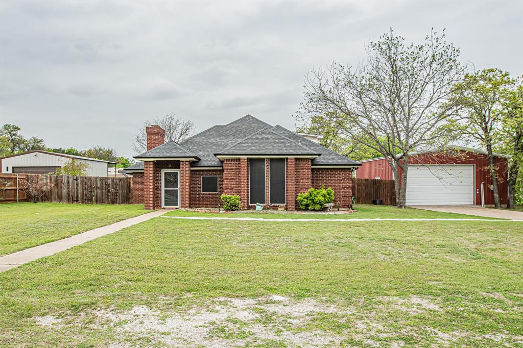 Welcome to 614 Overhill Rd, just outside the city limits near Lake Granbury. With no HOA and plenty of breathing room, this property gives you the freedom and flexibility you’ve been wanting. Set on a shaded half-acre lot with mature trees, this 4-bedroom, 3-bath home has great curb appeal the moment you pull up. You’re only about a minute from the boat ramp and roughly 10 minutes from historic Granbury Square—perfect for lake days and weekend outings, and serving as a prime location for vacationers. Investors will also appreciate the property’s potential as a lucrative Airbnb, offering a peaceful lakeside retreat for guests year-round.. Inside, the open layout feels warm and welcoming. The kitchen is built for real life: granite countertops, a separate cooktop, double ovens, and tons of cabinet space, making it easy whether you’re cooking for just you or hosting family and friends. What really sets this home apart is how flexible it is. You’ll find multiple living and dining areas—including a breakfast room, formal dining, and family room—plus an extra flex space with an ensuite bathroom that could work as a private bedroom, home office, or guest suite. Upstairs, the fourth bedroom offers even more options: it’s big enough to become a game room, hobby space, or quiet retreat. Out back, the yard is made for enjoying Texas weather. There’s an above-ground pool with a large deck, a covered patio for hanging out or entertaining, and a 30x30 metal shop with AC and power. The shop has doors on both sides, so it’s great for projects, storage, or whatever you need it to be. If you’re looking for a home with room to grow, space to make it your own, and the kind of lifestyle that actually feels good to live in, whether for yourself or as a rental property, 614 Overhill Rd checks all the boxes.
