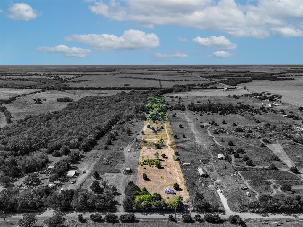 Discover the perfect blend of peace, privacy, and possibility on this beautiful 7.979-acre tract in Cooper, Texas. Ready for your vision, this property is already equipped with a water meter, electricity, and a septic system—making it ideal for building your dream home or placing a mobile home with ease. The land offers a clean, level front area with scattered mature trees, while the back portion transitions into heavily wooded terrain rich with wildlife, creating the perfect backdrop for anyone seeking space, serenity, or a rural retreat. With no known restrictions and versatile potential uses including agricultural, ranching, or residential, you’ll enjoy total freedom to make this acreage your own. Located just 10 miles from A&M-Commerce, Walmart, and local dining—and only 5 miles from Dairy Queen—you’ll have peaceful country living without sacrificing convenience. Don’t miss this rare opportunity to own nearly 8 acres of unrestricted, utility-ready land in a quiet and scenic setting.