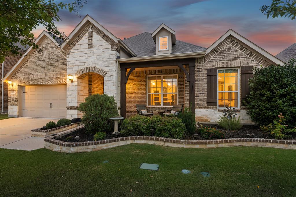 FLEXIBLE MULTI-GEN FLOOR PLAN WITH MANY CUSTOM OPTIONS! ~ Welcome to 932 Basket Willow Terrace, PRIDE OF OWNERSHIP  IS EVIDENT AS SOON AS YOU ENTER.  This IMMACULATE home is designed to create an inviting atmosphere, making it perfect for families and gatherings. This 4-bed, 3-bath home is a rare find. At 3358 sq ft, it stands out with a thoughtfully crafted layout, offering 3 distinct living areas under one roof, perfect for extended family, guests, or flexible living needs. Step inside to a bright, open-concept layout filled with natural light and designer touches throughout. Just off the entryway is a private office w custom-built-in cabinetry and a desk. The spacious living room boasts hardwood floors, custom drapery, and a wall of windows overlooking the covered back patio and lush backyard. At the heart of the home, the chef’s kitchen shines with a custom backsplash, an ornate hood vent, and an oversized island w farmhouse sink and breakfast bar seating. A generous, light-filled dining room makes hosting effortless, while an adjacent nook with a built-in workstation adds everyday convenience. The primary suite is a true sanctuary with its rounded bay window, hardwood floors, and soaring ceilings. The spa-inspired ensuite offers a curbless shower, dual vanities, a separate makeup vanity, and a spacious walk-in closet. Upstairs, a versatile living area with built-in shelving, a full bath, and a private bedroom makes an ideal guest suite , A standout feature of this home is the separate multi-generational wing, discreetly tucked behind a sliding barn door. This private retreat includes its own living room, dining area, kitchenette with farmhouse sink,  built-in cabinetry, two bedrooms & full bath, offering comfort, independence & privacy for loved ones or long-term guests. Enjoy evenings outdoors on the covered patio overlooking the landscaped yard. Conveniently located with easy access to HWY 287 or I35W SCHEDULE YOUR SHOWING TODAY!!..