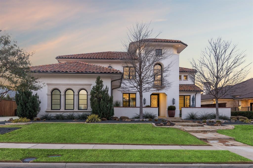 This Spanish-style home designed by award-winning architect Lloyd Lumpkins boasts a variety of amenities. Operable glass wall system opens the family room to the outdoor living area, pool and spa, providing a seamless connection with nature. Transitional modern finishes and timber trusses. The gourmet kitchen is equipped with quartzite countertops, an island, self-closing quiet drawers, double dishwashers, sub-zero freezer, built in refrigerator, warming drawer, and commercial-grade appliances that will impress even the most discerning chefs. Downstairs has additional breakfast room, a media room, dining, library with a computer niche, a mudroom off the utility room, a 3-car garage, additional bedroom and master suite. Indulge in luxury in the spacious master suite, freestanding tub and separate shower, his and her closets. The second story has 3rd 4th bedrooms with a Jack-Jill bath. The 5th bedroom with loft and balcony and ensuite bath. The attic space is designed as a workout room.