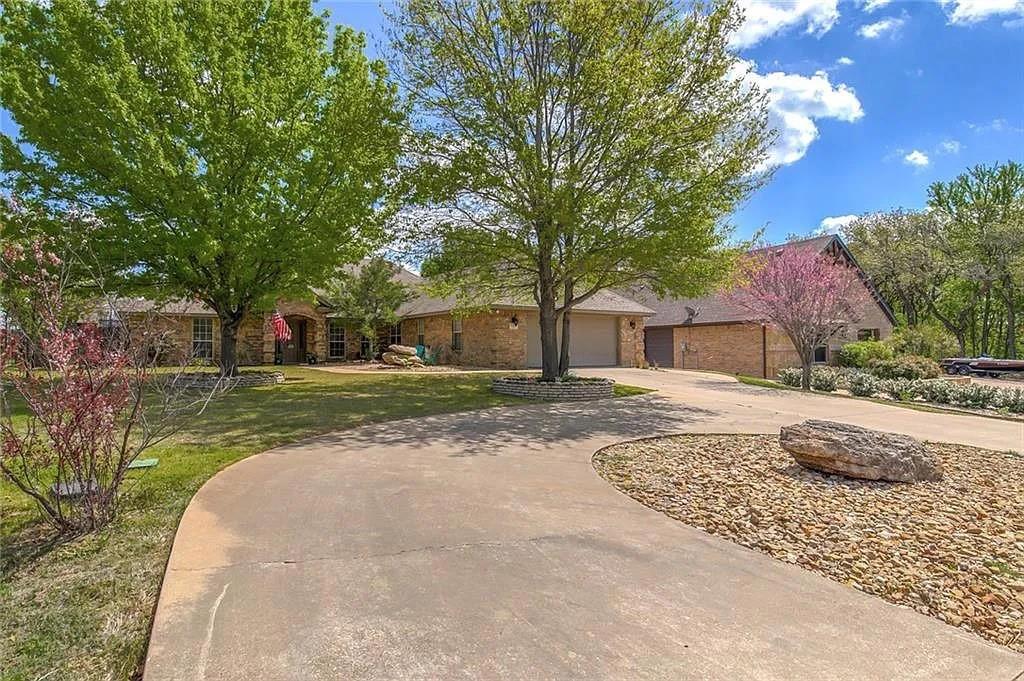 Welcome home to DeCordova Bend Estates  where comfort, space, and entertainment come together perfectly. This beautiful 3 bedroom, 2.5 bath, home also features a dedicated media room and private office, giving you all the space you need to live, work, and entertain in style. With an acceptable offer, the seller is offering an incredible opportunity. 10,000 toward the buyer’s initiation and administration fees to this gorgeous gated golf course community. Designed for entertaining both inside and out, this home offers a spacious backyard complete with a covered patio, perfect for relaxing evenings or hosting guests. Inside, the kitchen shines with granite countertops, stainless steel appliances, and plenty of workspace for cooking and gathering. The media room is fully equipped with a 100-inch roll-down screen and projection media system, creating the ultimate movie-night experience.The primary suite is a true retreat featuring a spa-like en suite bath with dual vanities, a soaking tub, separate shower, and a large walk-in closet. The 2 car garage also comes complete with space for your golf cart.  Don’t miss your opportunity to enjoy resort-style living in one of Granbury’s most sought-after communities!