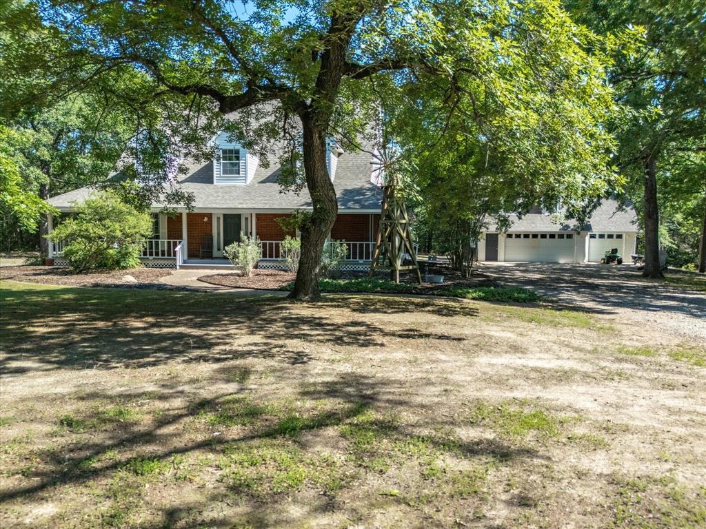 Welcome to your peaceful paradise!  This property is a one-of-a-kind retreat, on nearly 10 acres.  With 4 bedrooms and 3 full baths in the main house and a bonus room, currently being used as an office above the garage.  It provides the space you need and flexibility!  All of the bedrooms have ceiling fans and walk-in closets.  Also, the upstairs bath is a Hollywood bath floor plan style, featuring a shared, central room for commode and tub-shower, flanked by separate vanity areas connecting the two bedrooms, allowing optimal functionality. The 3 car garage has AC and workbench with a sink providing the handyman or woman their happy place! Inside, the kitchen contains all you need to provide the delicious meals for your household with gas cooktop, electric oven, dishwasher and walk-in pantry.  You’ll have the room to entertain as well with a dining room and breakfast nook, and breakfast bar to accomodate barstools.  Sit outside on the beautiful porch that nearly wraps the home, and have your morning coffee or afternoon beverage.  The fenced paddock area is ready for your animals.  The property is fully fenced with a secure gated entrance.  There are trails through the wooded acreage that you’ll enjoy hiking and enjoying nature.  You will love being able to work from home with the available high speed internet.  There is even reassurance you will have the means necessary to charge your generator or other units (Tesla) with the 50 volt charging station.  Are you looking for a place where you can move in and don’t have to get busy with needed projects?  This beautiful property has been lovingly cared for and you will see that it is turn-key and ready for you!  It is being offered at a price that you will want to move on or it may be gone! Plan on seeing this property before it is claimed by someone else!  You will not be disappointed! Buyer will need a new survey.
