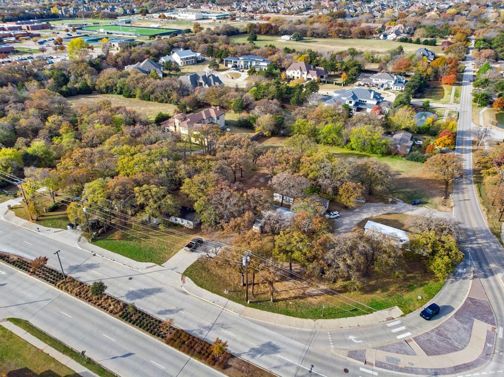 Prime Southlake location. Beautiful, wooded piece of property in Southlake with endless opportunities. Easy access to Hwy 114. Nearby to medical, shopping, dining and DFW airport. Perfect opportunity for to build your dream home on this estate location of 2 acres or subdivide and develop.  Mobile homes on property will be removed. Small house on property is tear down, value is in the land.  Recently surveyed and both tracts being sold together.