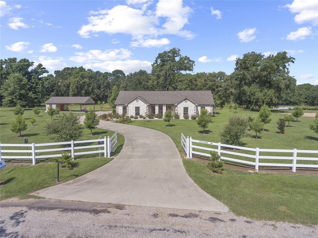 Peace, tranquility and all the amenities Lake Bob Sandlin offers. This beautiful country estate home is situated on 8.9 acres that offers plenty of room for expansion and entertainment. You will enjoy all mother nature has to offer from the views of every window in this sprawling floor plan that features high ceilings. Wide doorways and wheelchair accessible. The primary bedroom suite features a walk-in tub-shower and boast a tremendous sized walk-in closet. The gourmet kitchen opens to a spacious living area from all angles and has a fireplace. The massive sunroom and butler's pantry make this a family home for all occasions. Two deep wells service the home. Oversized 2 car garage is plumbed for an additional bath. Serene view from the bridge overlooking the pond. Walk right out your front door across the street to access the boat ramp. This property is located in one of the lakes first original subdivisions with a full marina about a mile up the road. Lake Bob Sandlin is approx. 2 hours from the Dallas Fort Worth area.