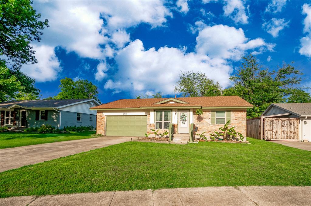 Welcome to 2518 Newcastle Dr—an adorable one-story home with charming curb appeal, a welcoming front porch, and even banana trees nestled in the front garden beds for a unique touch of character. The property also features a convenient two-car garage and sits in a great location close to everything you need. Inside, the home opens to a spacious living room that flows seamlessly into the dining area and kitchen, creating an easy, open layout perfect for everyday living and entertaining. The kitchen is equipped with granite countertops, stainless steel appliances, and direct access to the backyard. The primary bedroom offers a private ensuite bath and connects to a hallway leading to two additional bedrooms and a full bath, providing a functional and comfortable layout. Throughout the home, wood and tile flooring make maintenance simple and stylish, while new windows throughout enhance natural light and energy efficiency. Step outside to a generously sized backyard complete with a shed—an ideal blank canvas to create your dream outdoor space. Whether you envision a garden, play area, or relaxing retreat, the possibilities are endless.
