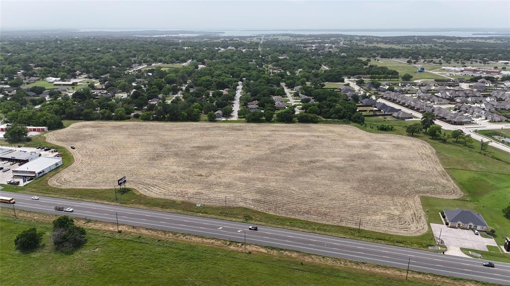 Outstanding 17-acre development tract featuring approximately 776 feet of prime frontage along Hwy 377. With the future extension of Main Street set to create a hard corner at this location, this property offers unmatched potential for commercial or mixed-use development. Main Street will provide a straight shot into historic downtown Pilot Point, enhancing visibility and accessibility. Tracts available from 1 to 17 acres, allowing flexibility for a variety of projects. Located in a high-growth area with excellent traffic exposure and strategic positioning for long-term value.

All information provided is deemed reliable but is not guaranteed and should be independently verified. Property boundaries, zoning, availability of utilities, and development potential are subject to change and must be confirmed by the buyer. Irick Real Estate and its agents make no warranties, express or implied, regarding the accuracy of this information. Prospective buyers are encouraged to conduct their own due diligence with appropriate professionals and governmental entities.
